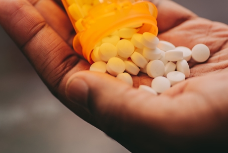 Prescription drugs in hand