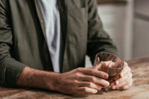 Man Holding Empty Glass