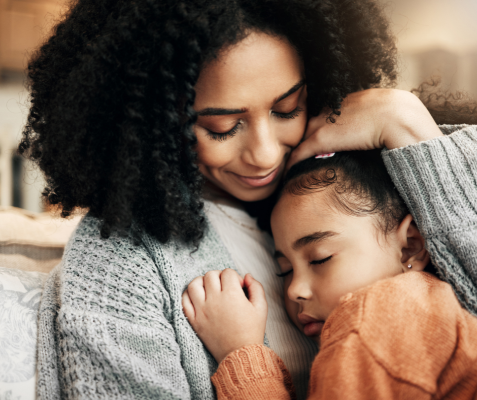 A Woman Holding Child